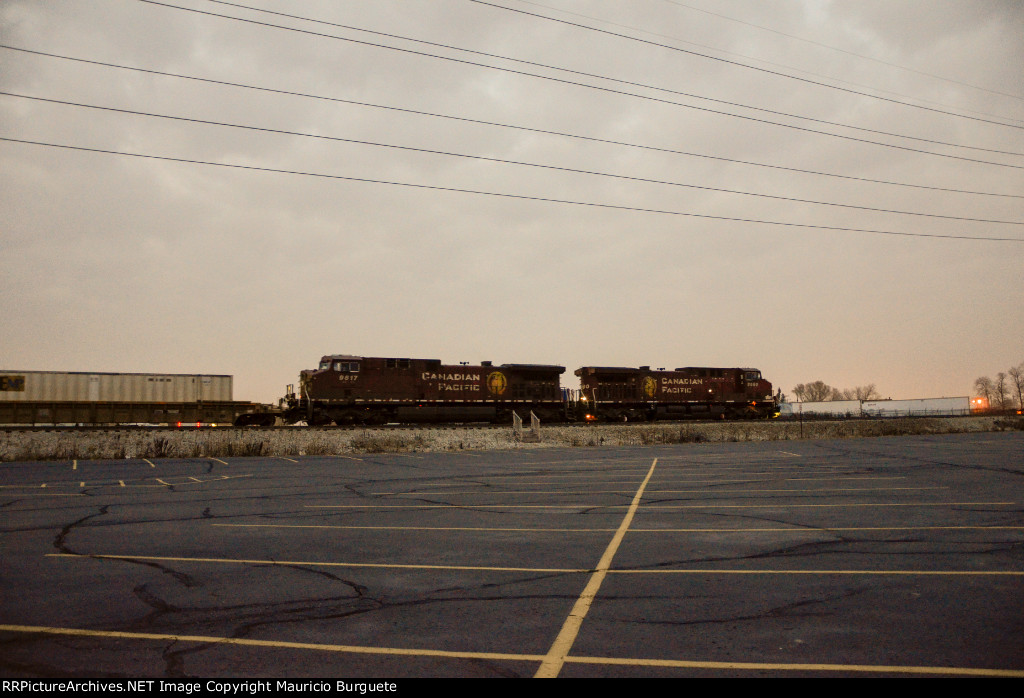 CP AC44CW Locomotives leading a train